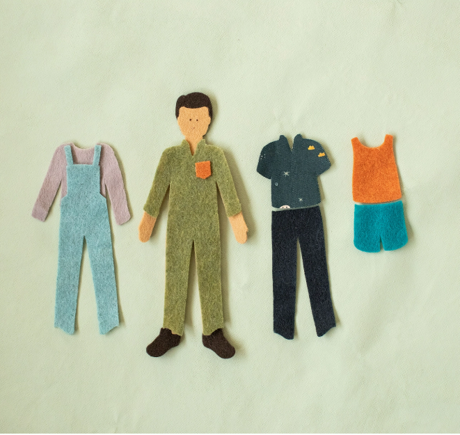 Felt boy doll with changeable clothes