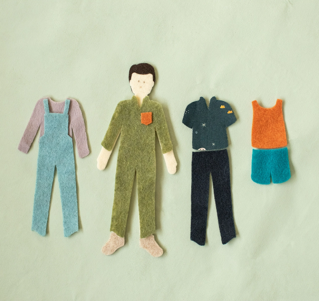 Felt boy doll with changeable clothes